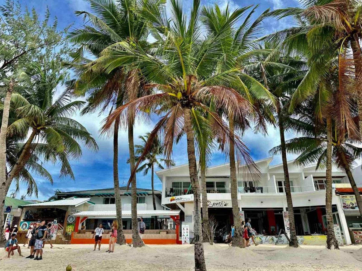 Calypso Beach And Dive Resort Manoc-Manoc Bagian luar foto
