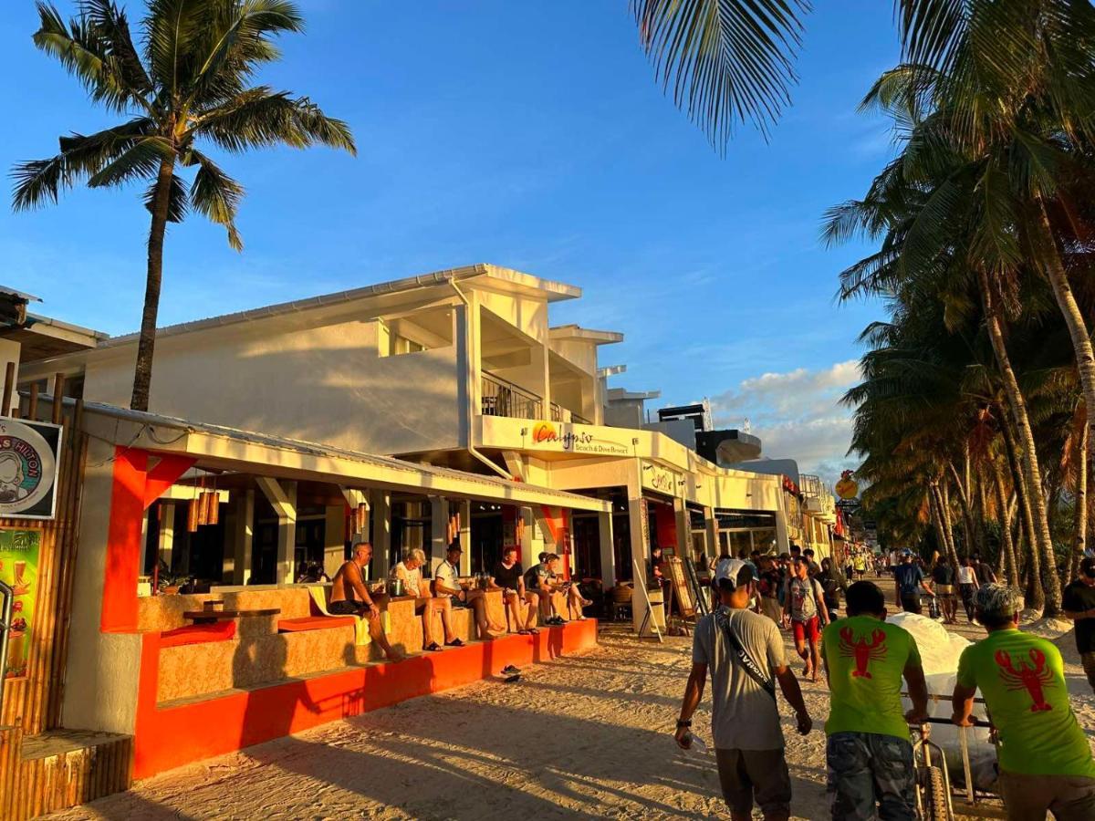 Calypso Beach And Dive Resort Manoc-Manoc Bagian luar foto