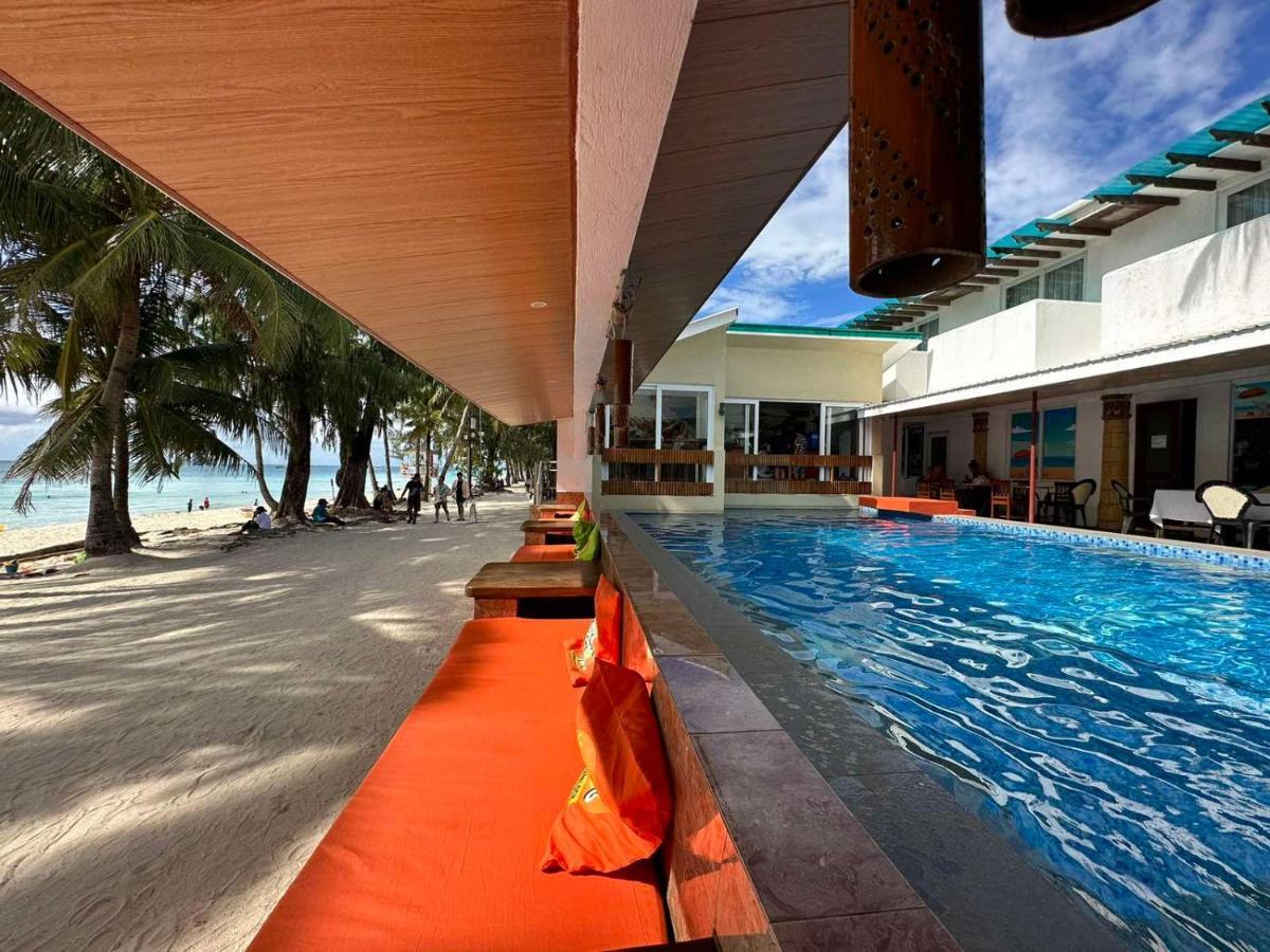 Calypso Beach And Dive Resort Manoc-Manoc Bagian luar foto