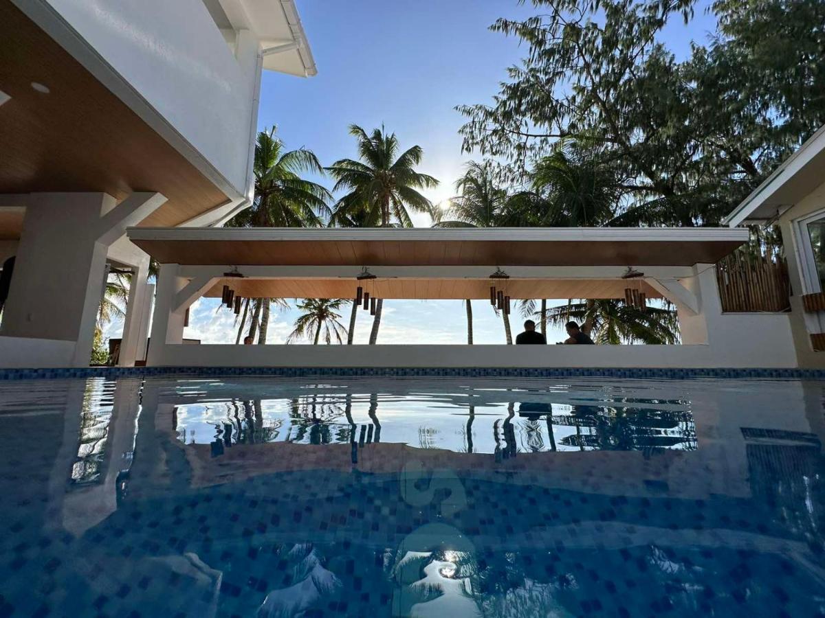 Calypso Beach And Dive Resort Manoc-Manoc Bagian luar foto