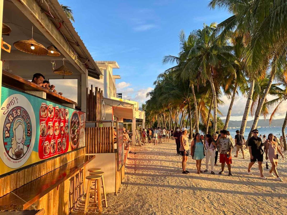 Calypso Beach And Dive Resort Manoc-Manoc Bagian luar foto
