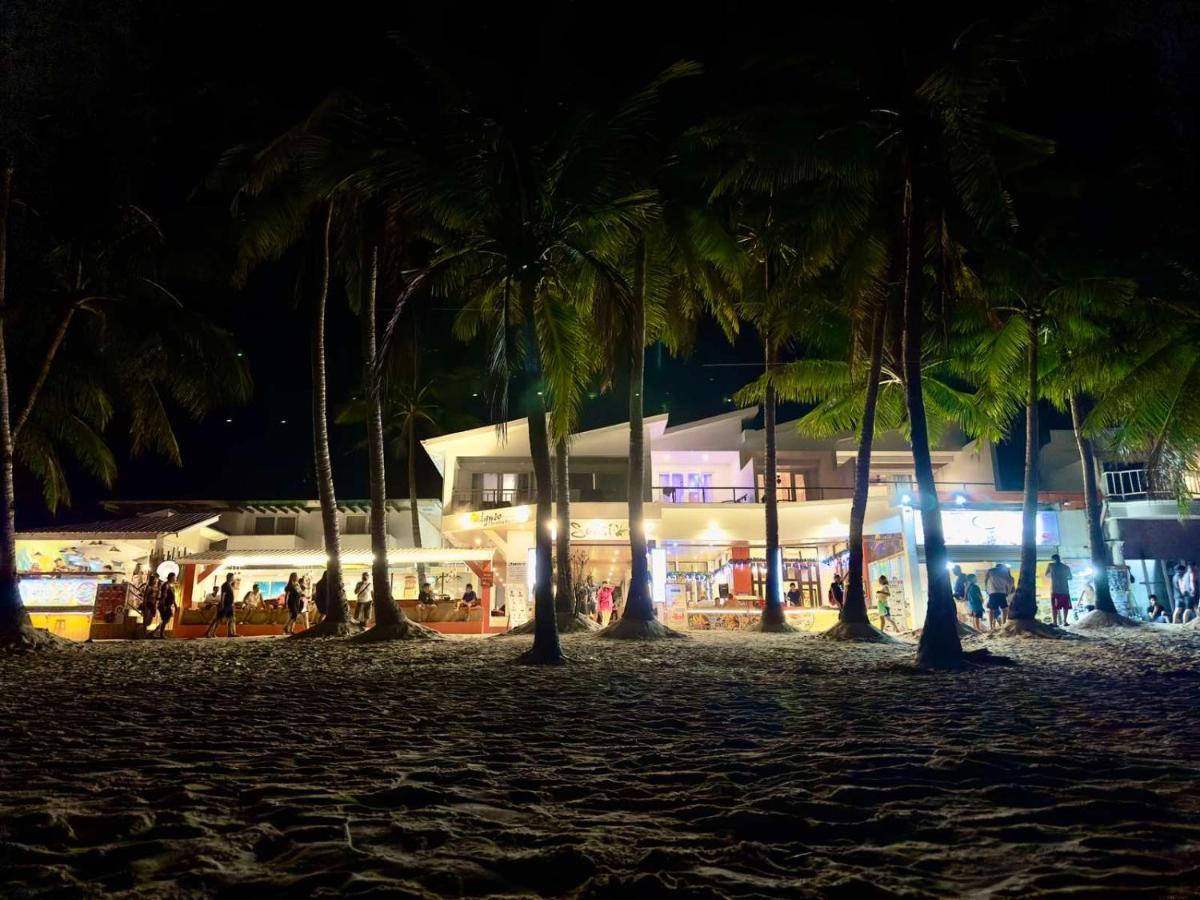 Calypso Beach And Dive Resort Manoc-Manoc Bagian luar foto
