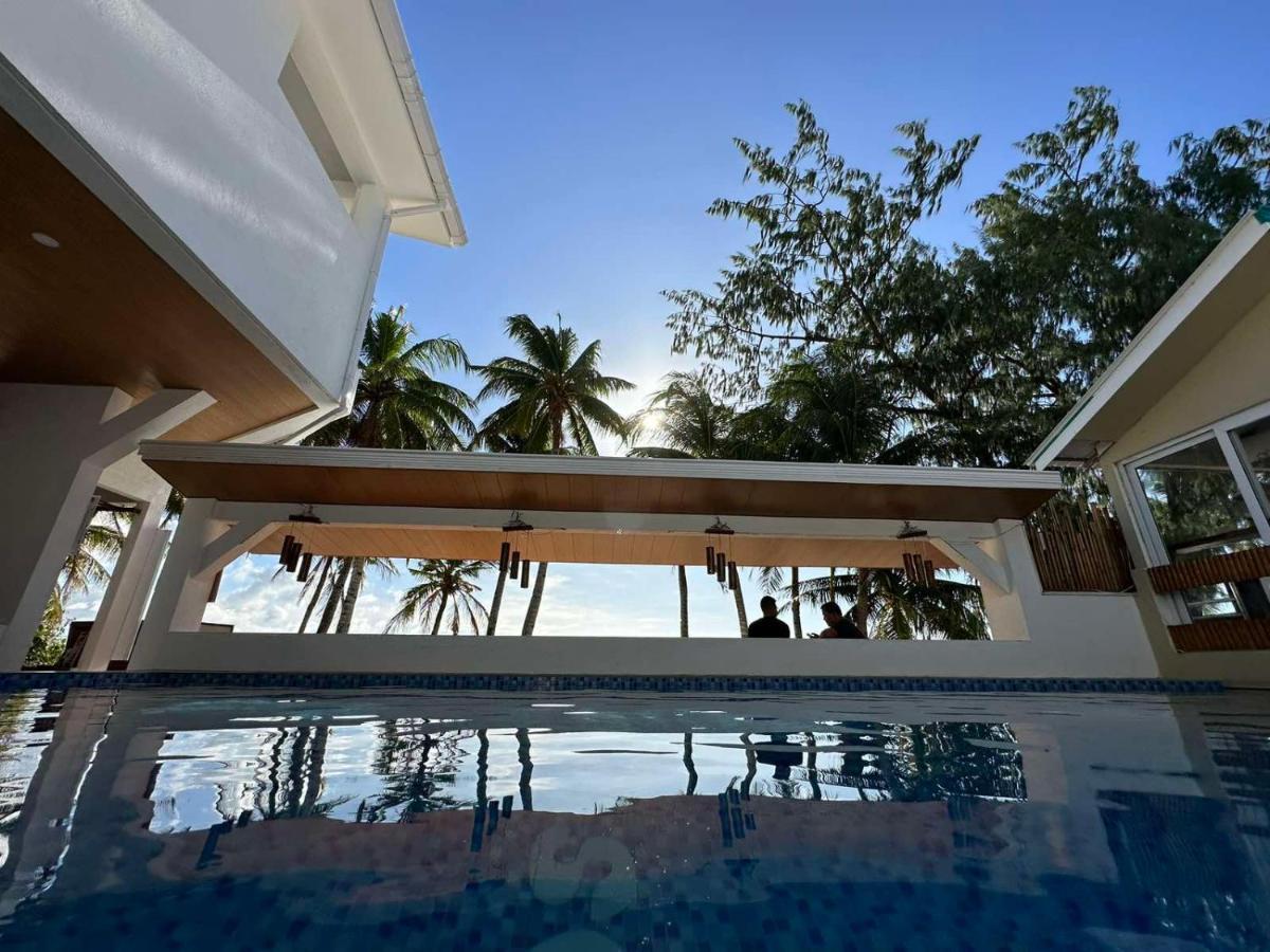Calypso Beach And Dive Resort Manoc-Manoc Bagian luar foto