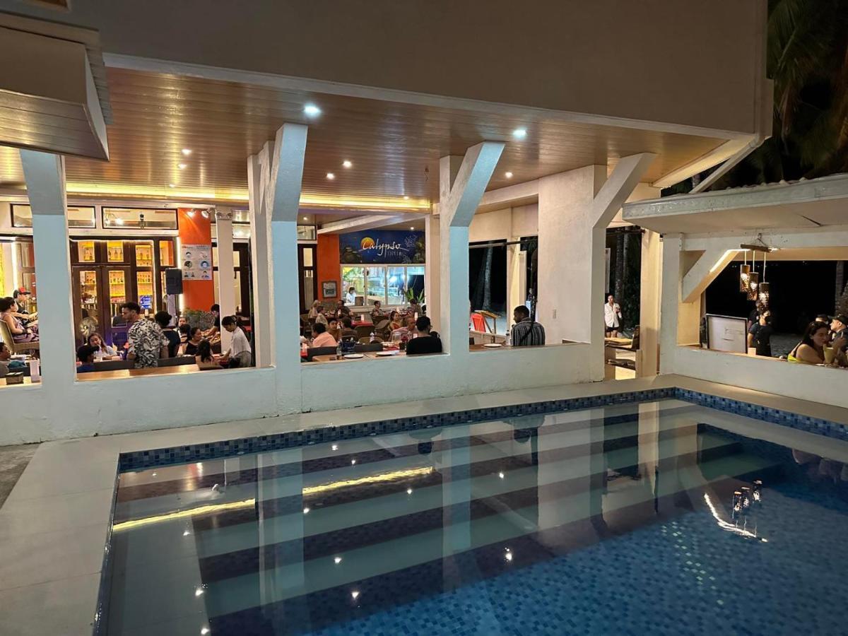 Calypso Beach And Dive Resort Manoc-Manoc Bagian luar foto