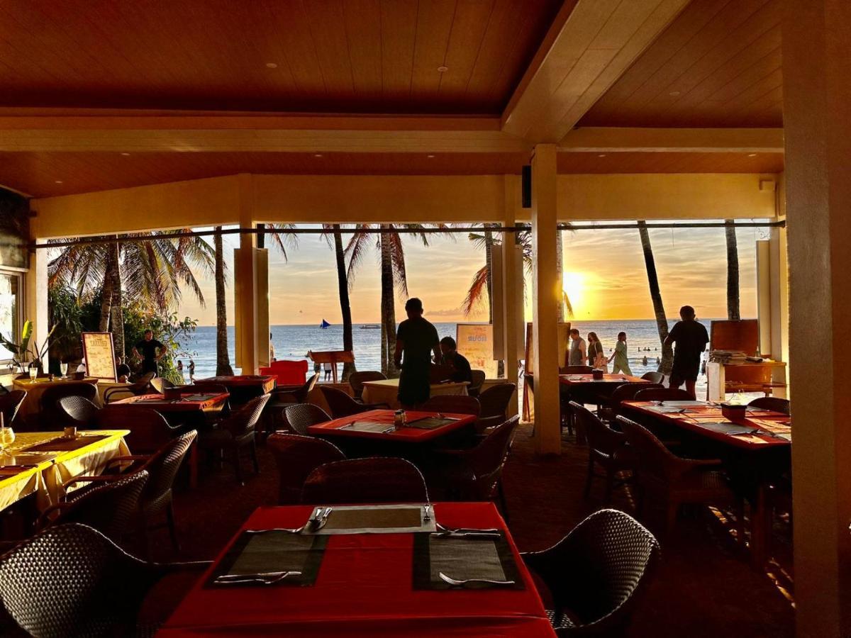 Calypso Beach And Dive Resort Manoc-Manoc Bagian luar foto