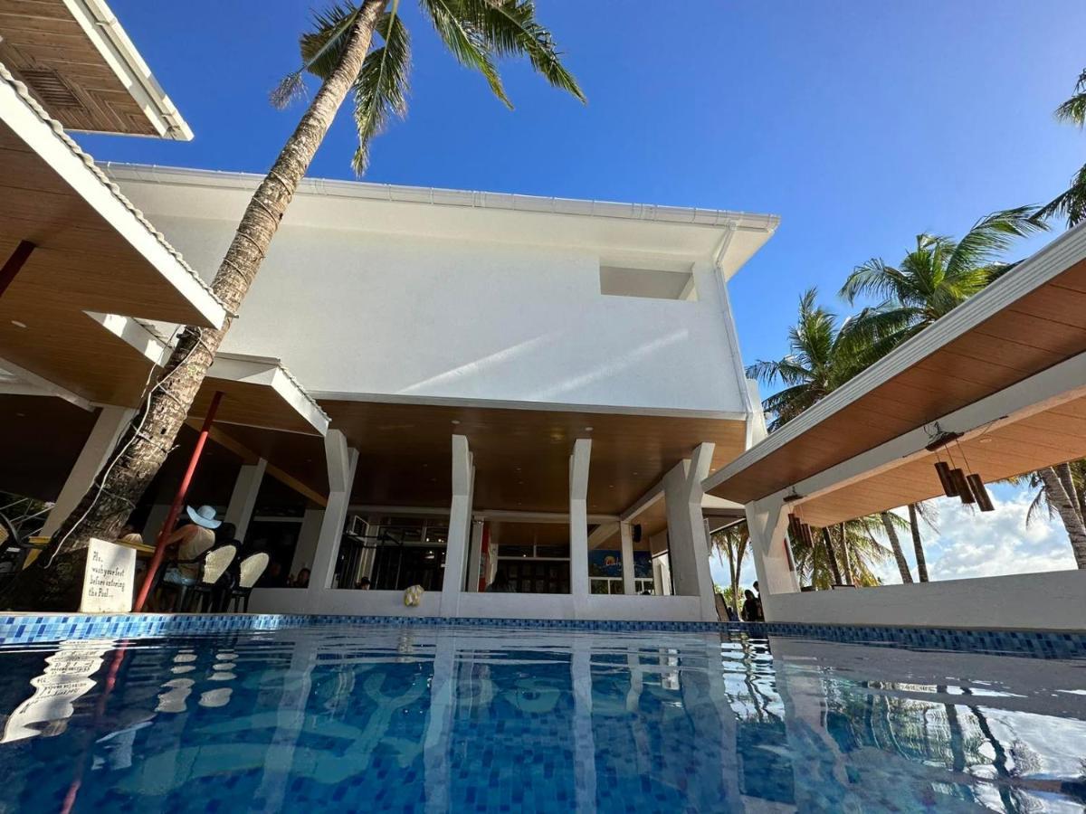 Calypso Beach And Dive Resort Manoc-Manoc Bagian luar foto