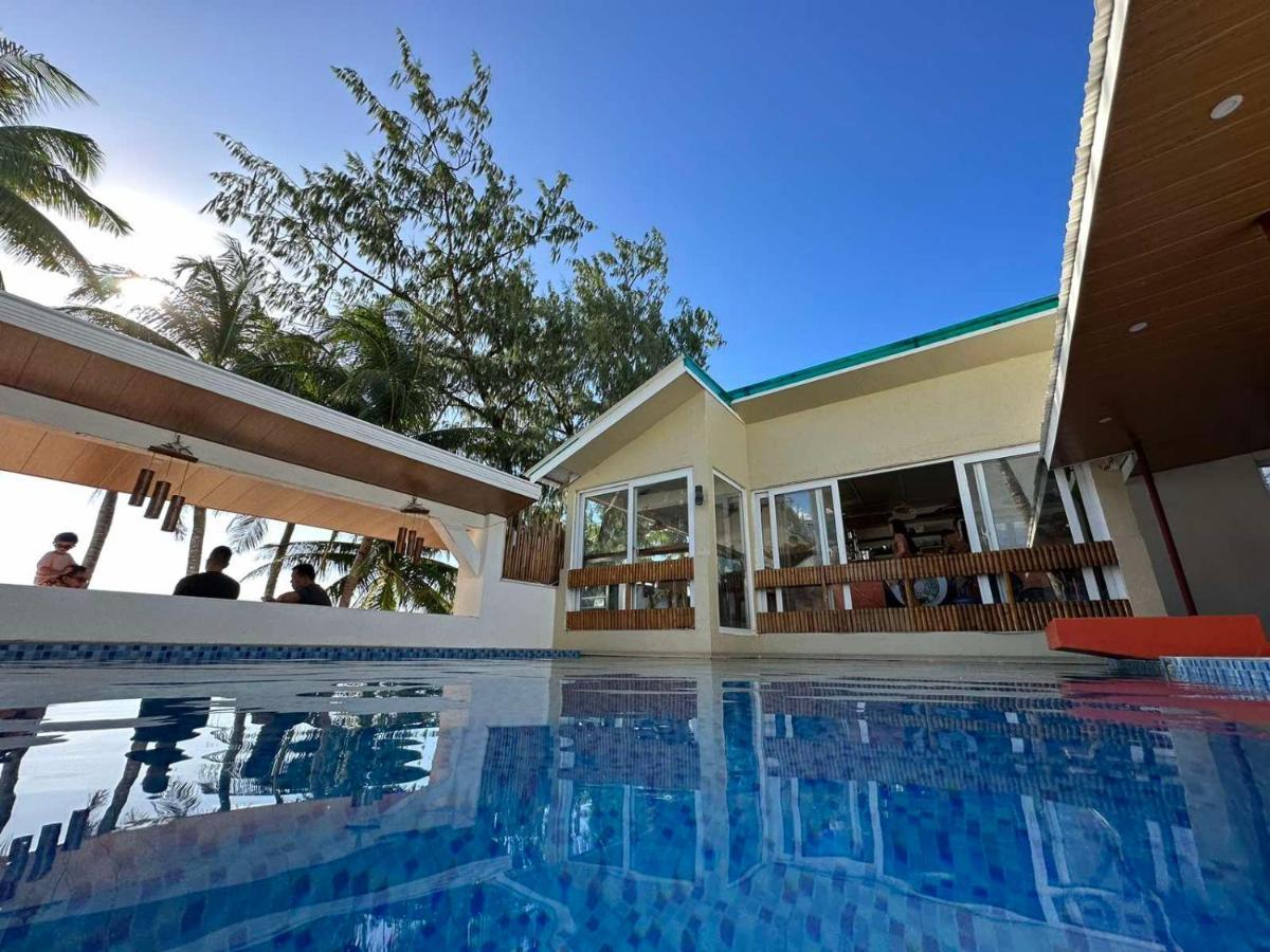 Calypso Beach And Dive Resort Manoc-Manoc Bagian luar foto