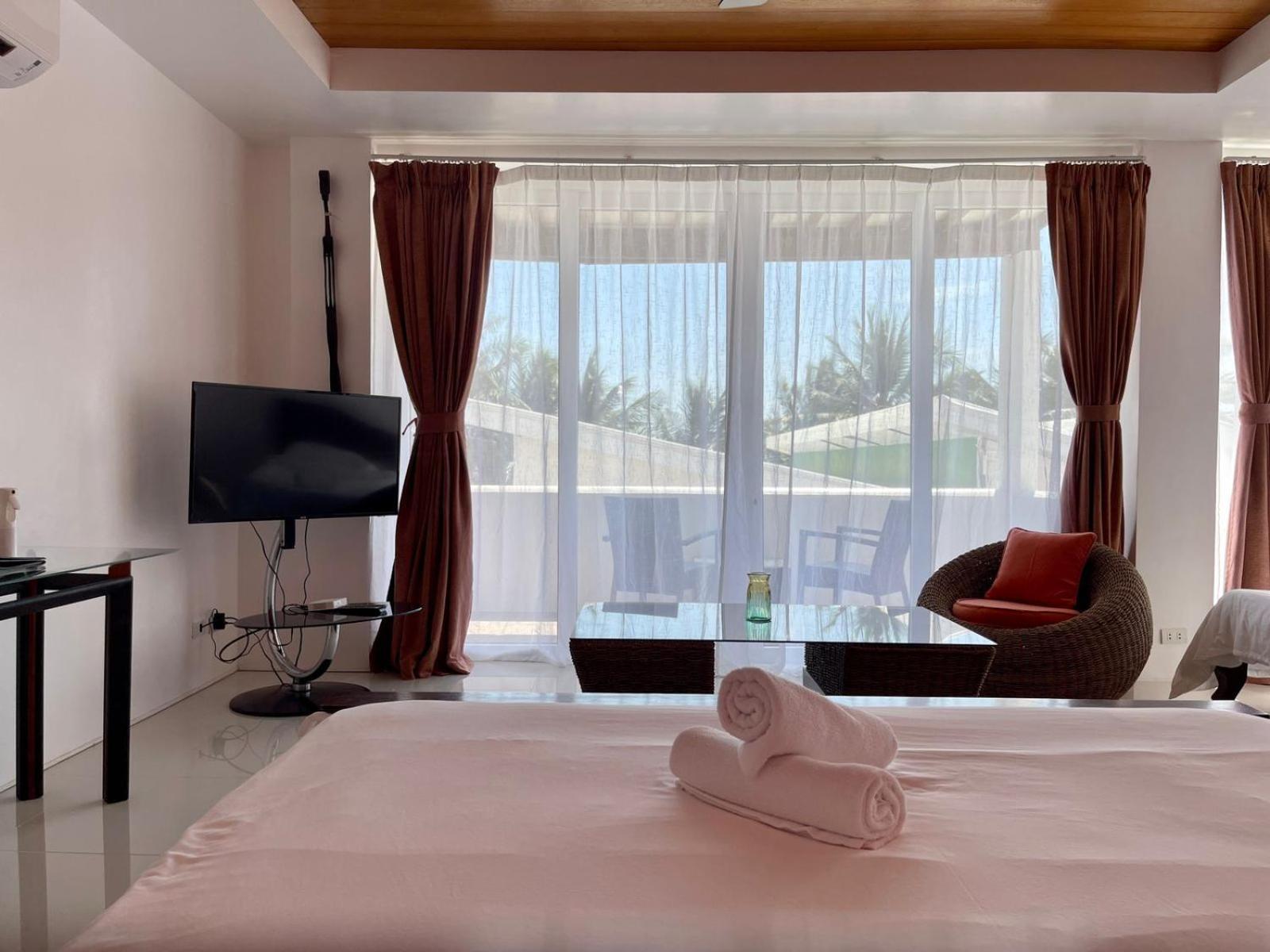 Calypso Beach And Dive Resort Manoc-Manoc Bagian luar foto