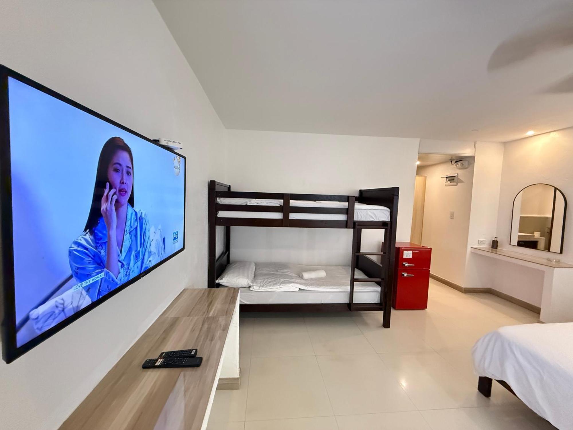 Calypso Beach And Dive Resort Manoc-Manoc Bagian luar foto