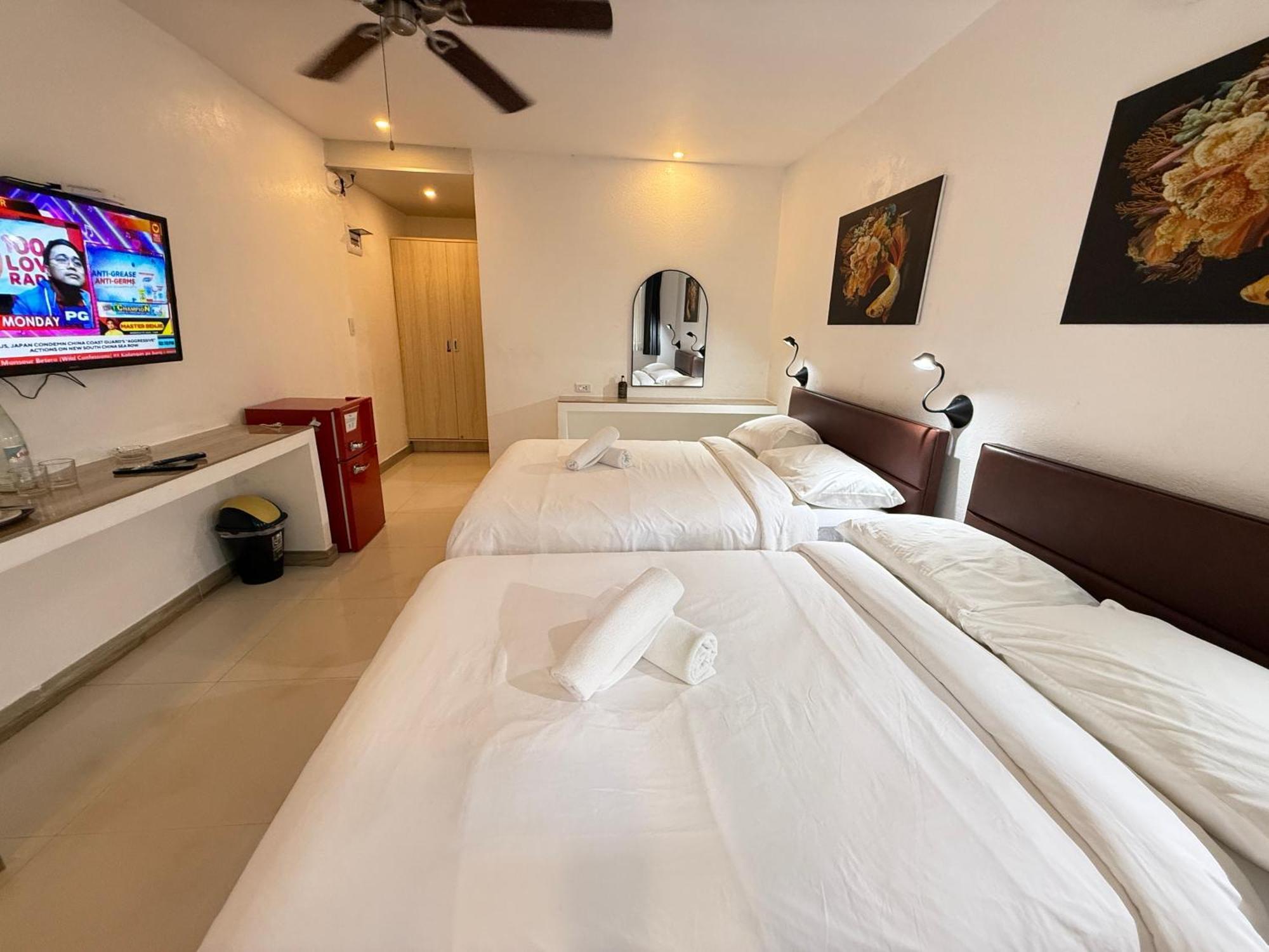 Calypso Beach And Dive Resort Manoc-Manoc Bagian luar foto