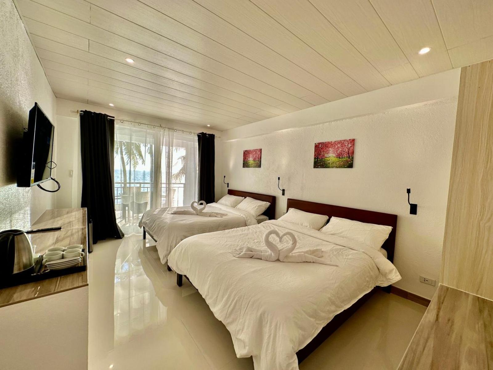 Calypso Beach And Dive Resort Manoc-Manoc Bagian luar foto