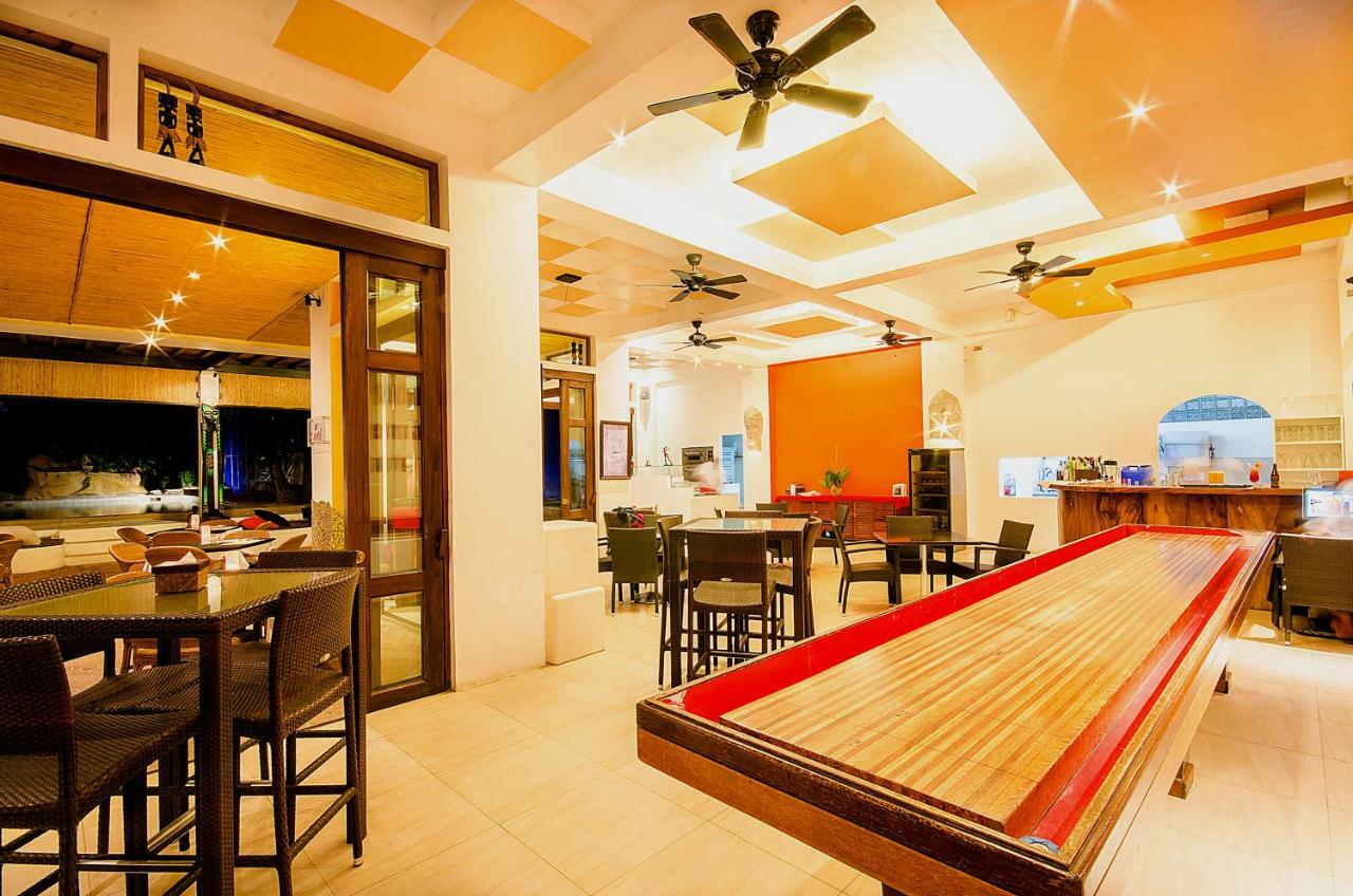 Calypso Beach And Dive Resort Manoc-Manoc Bagian luar foto