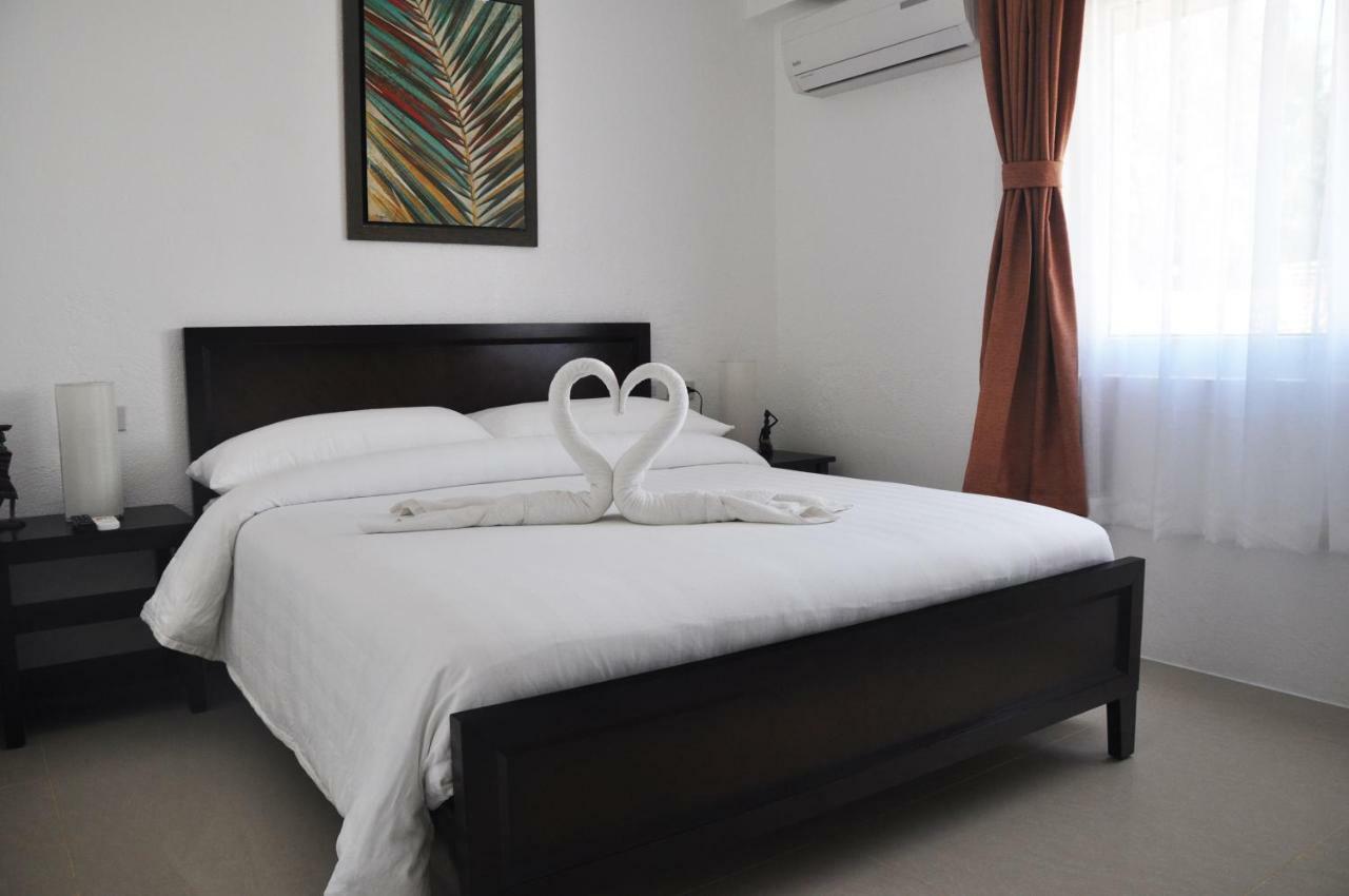 Calypso Beach And Dive Resort Manoc-Manoc Bagian luar foto