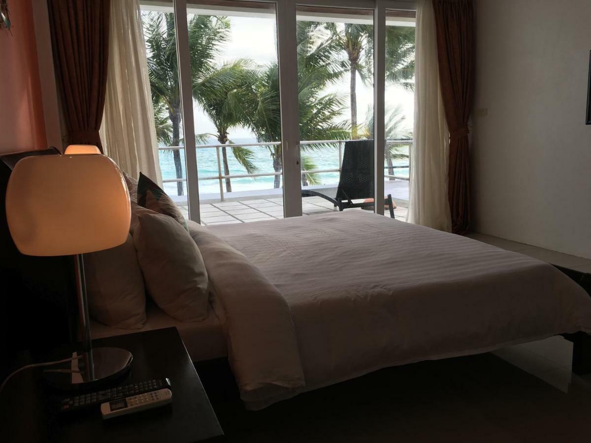 Calypso Beach And Dive Resort Manoc-Manoc Bagian luar foto