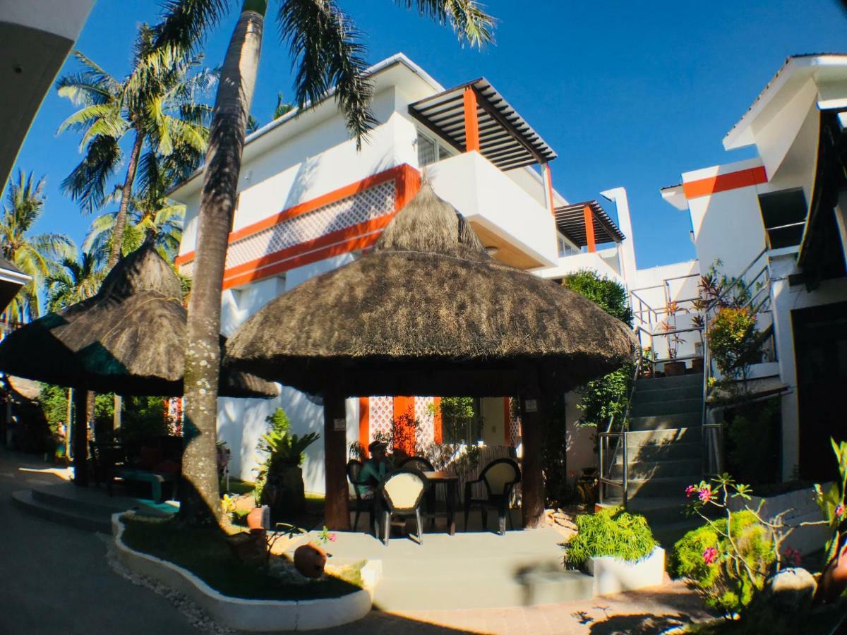 Calypso Beach And Dive Resort Manoc-Manoc Bagian luar foto
