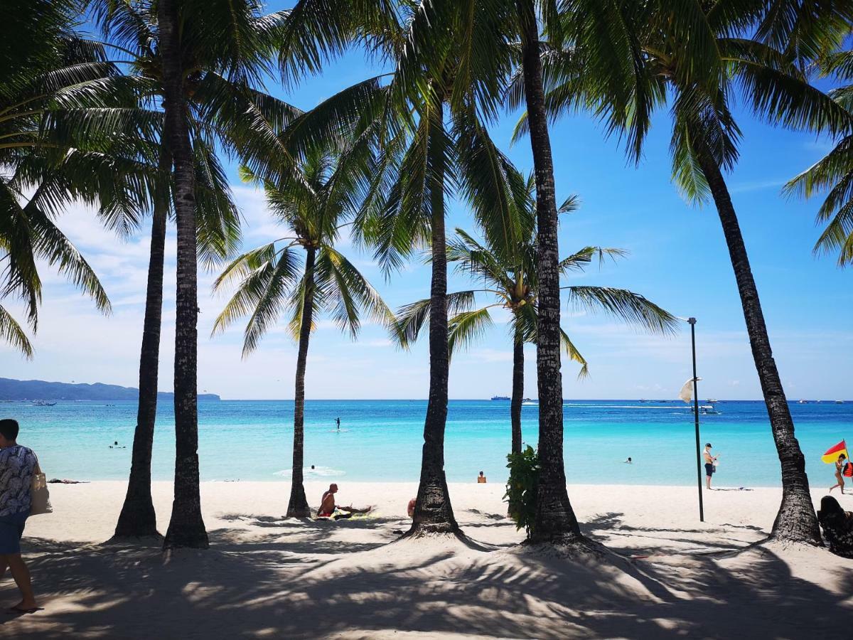 Calypso Beach And Dive Resort Manoc-Manoc Bagian luar foto