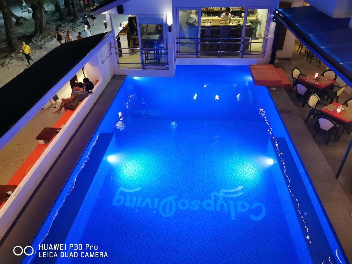 Calypso Beach And Dive Resort Manoc-Manoc Bagian luar foto