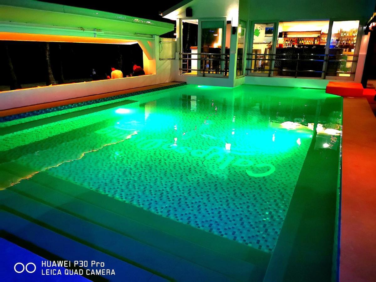 Calypso Beach And Dive Resort Manoc-Manoc Bagian luar foto
